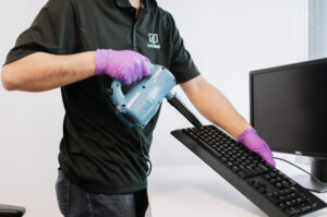 Cleaning a Keyboard with Health Canada Approved Cleaner